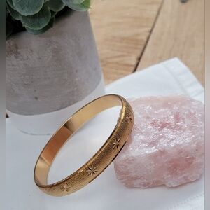 Vintage Monet Gold Tone Etched Starburst Bangle Bracelet